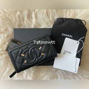 Chanel Caviar Filigree Zip Wallet